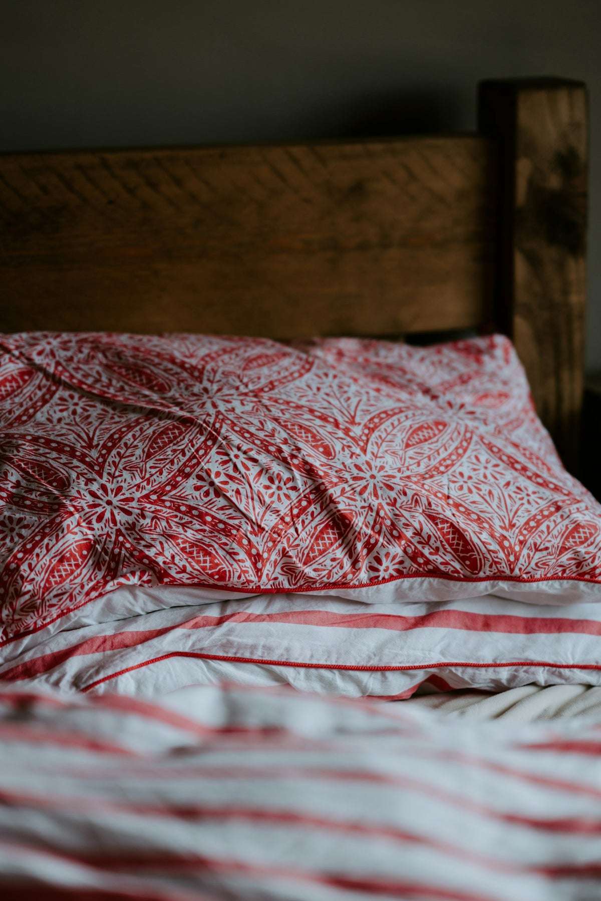 Red and white printed pillow and bedding