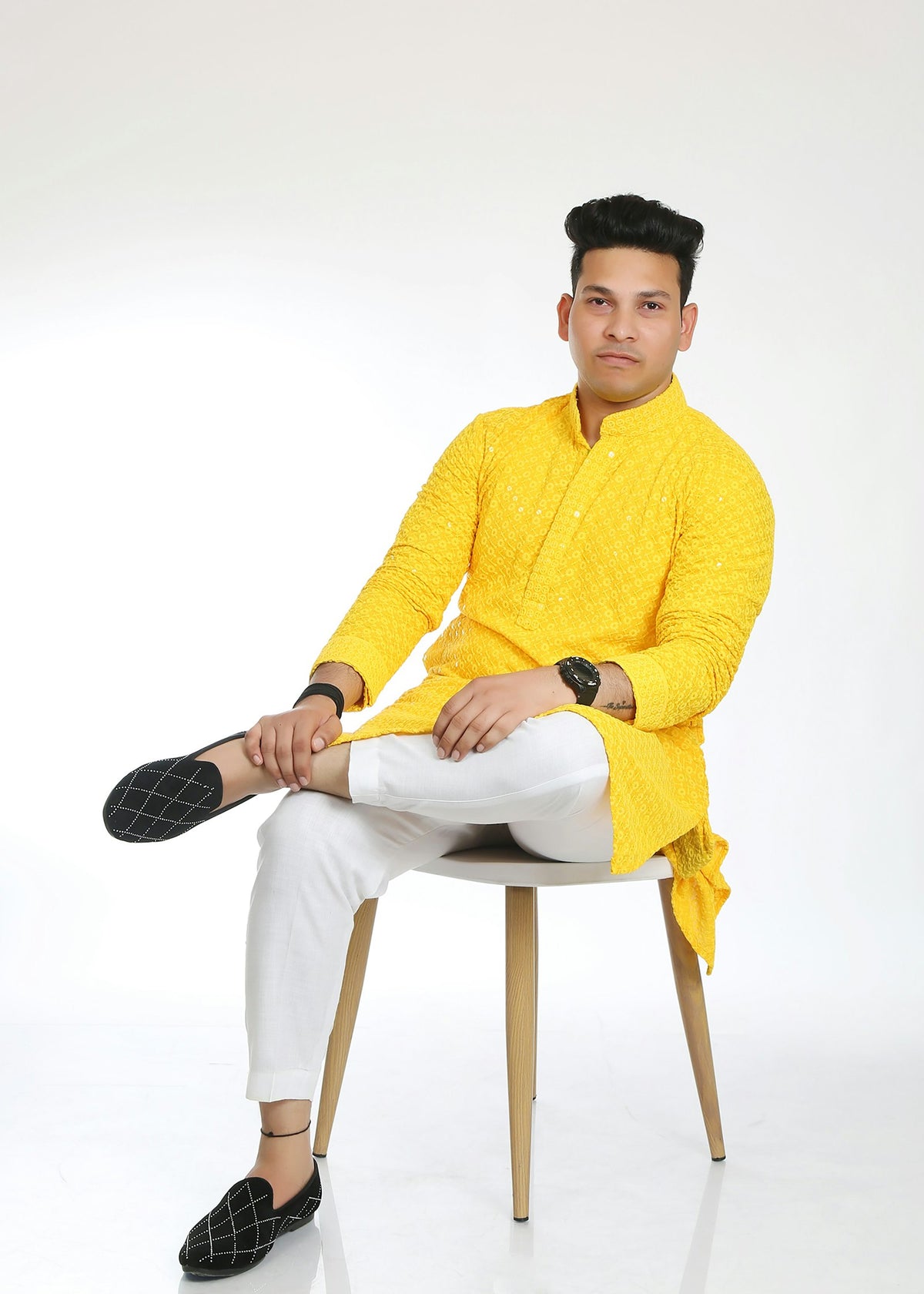 Man wearing a mustard yellow kurta