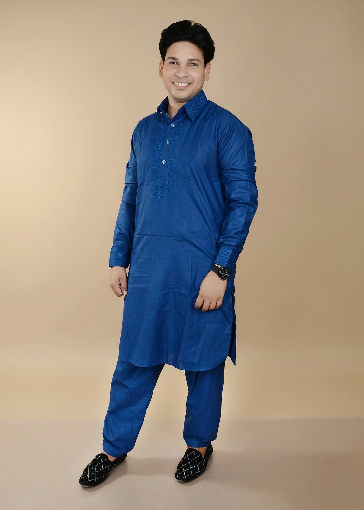 Man wearing an indigo blue kurta